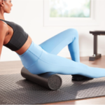 Woman using foam roller