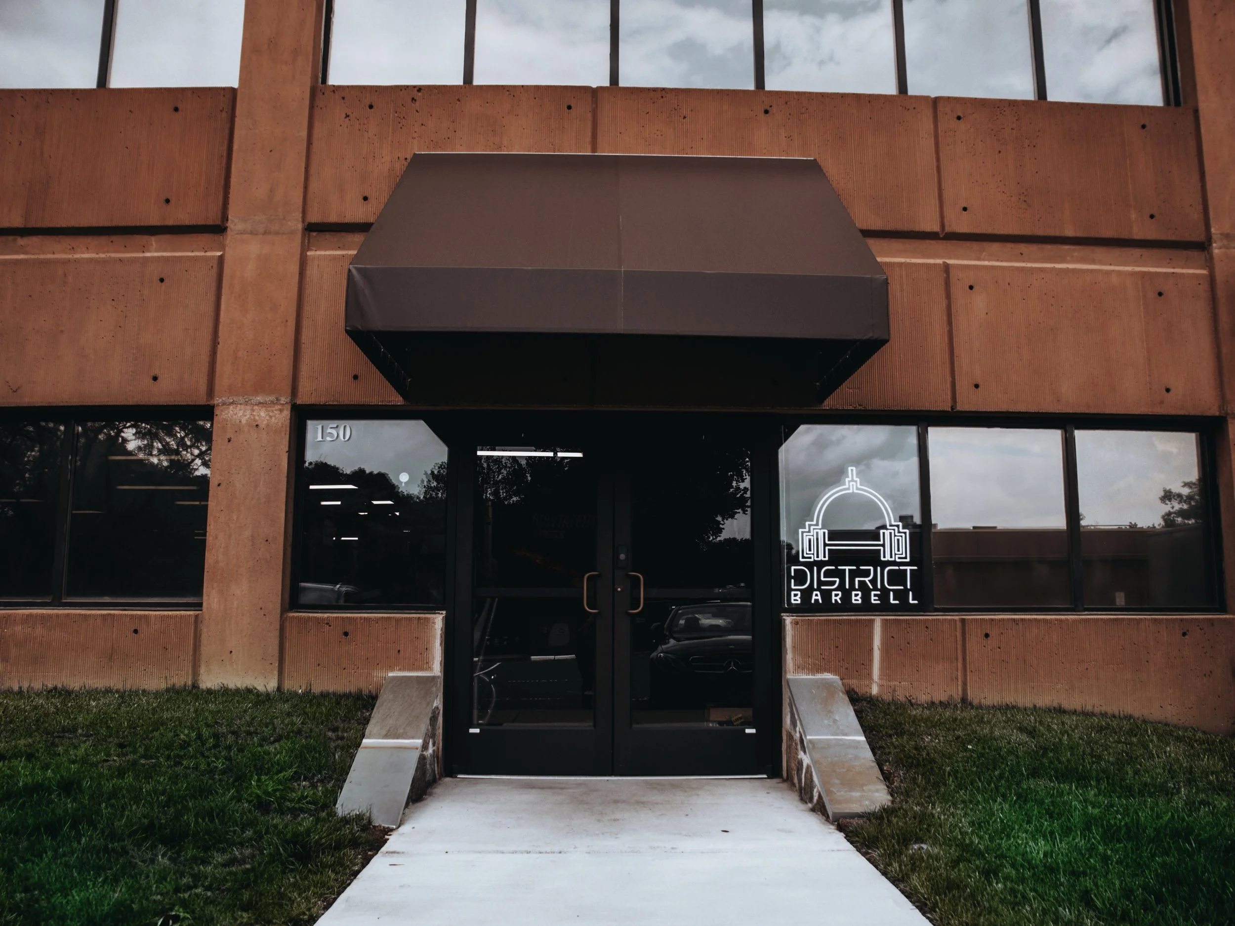 Entrance to District Barbell at 8550 Lee Highway, Suite 150, Fairfax