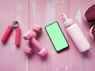 Fitness equipment and supplement containers illustrating strength training supplements after 40.